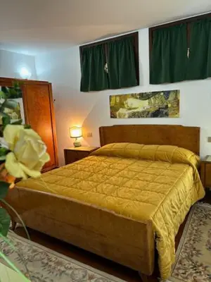 Letto o letti in una camera di VILLA ISELLA