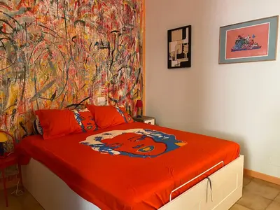 Letto o letti in una camera di CoolartHome