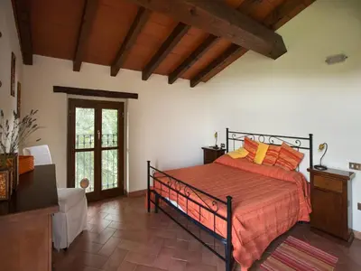 Letto o letti in una camera di Sunny holiday home with swimming pool