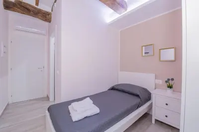 Letto o letti in una camera di Residenza Borgo Guazzo