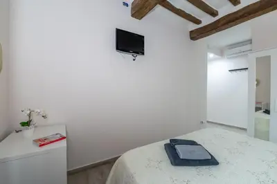 Letto o letti in una camera di Residenza Borgo Guazzo