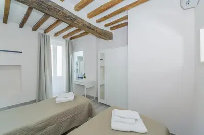 Letto o letti in una camera di Residenza Borgo Guazzo