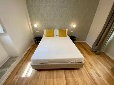 Letto o letti in una camera di Residenza d'epoca dei Fondachi