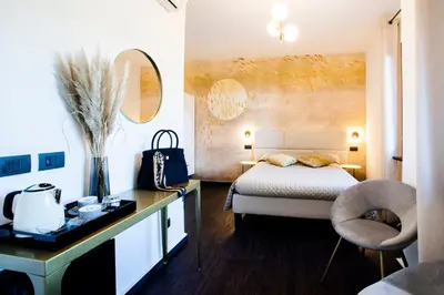Letto o letti in una camera di Bellevue - Rooms & Suites