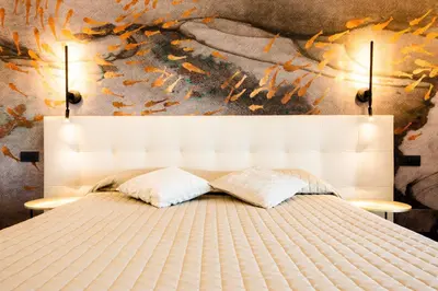 Letto o letti in una camera di Bellevue - Rooms & Suites