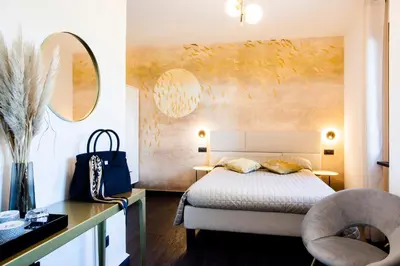 Letto o letti in una camera di Bellevue - Rooms & Suites