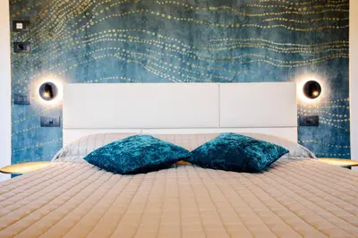 Letto o letti in una camera di Bellevue - Rooms & Suites