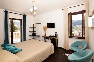 Letto o letti in una camera di Bellevue - Rooms & Suites