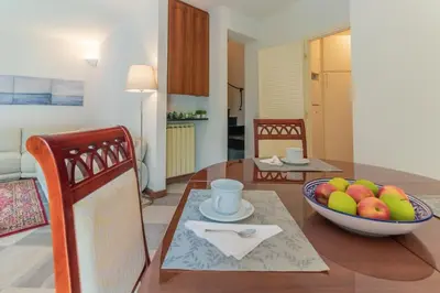 Cucina o angolo cottura di CASA CLAUDIA Relax con Patio e Parcheggio