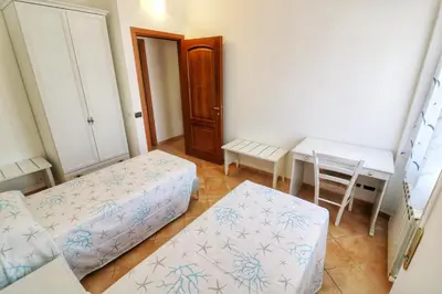 Letto o letti in una camera di La Pulce Salata