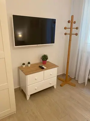 TV o dispositivi per l'intrattenimento presso Modern City Apartment