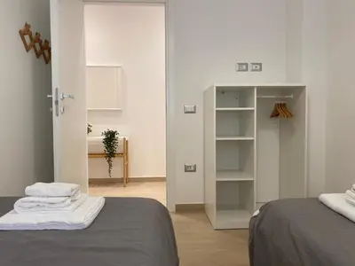 Letto o letti in una camera di Modern City Apartment
