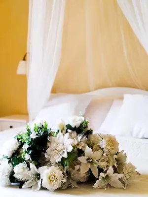 Letto o letti in una camera di AntiquaeLunae Casali