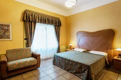 Letto o letti in una camera di Residence Liberty