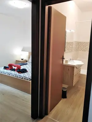 Letto o letti in una camera di La Casetta di Sofia 2