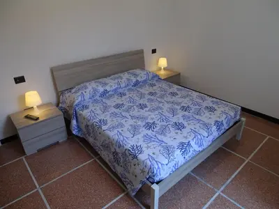 Letto o letti in una camera di Casa Jacopo 50 mt dal mare