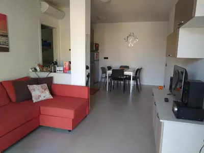 Area soggiorno di Giulia Apartment