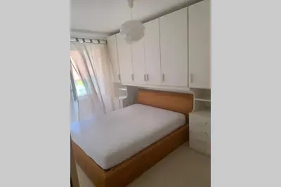 Letto o letti in una camera di Casa Giò a due passi dal mare