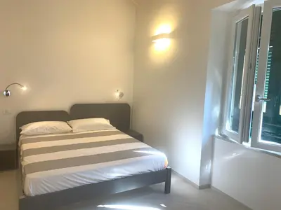 Letto o letti in una camera di Affittacamere Stella di Mare