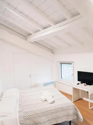 Letto o letti in una camera di Residenze Mazzini