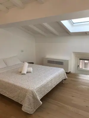 Letto o letti in una camera di Residenze Mazzini