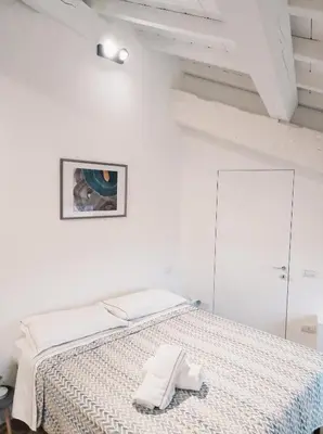 Letto o letti in una camera di Residenze Mazzini