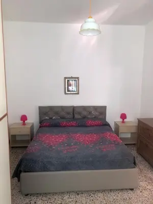 Letto o letti in una camera di Casa Bianca 5 - confortevole in centro a Moneglia