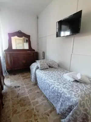 Letto o letti in una camera di HOTEL FIORE & Fiocchi