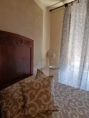 Letto o letti in una camera di HOTEL FIORE & Fiocchi