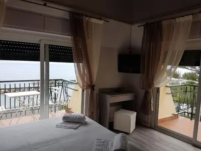 Letto o letti in una camera di Hotel Zia Piera