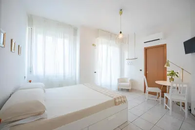 Letto o letti in una camera di Monolocale Farini