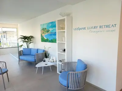 Area soggiorno di VistAmare Luxury Retreat Appartamenti