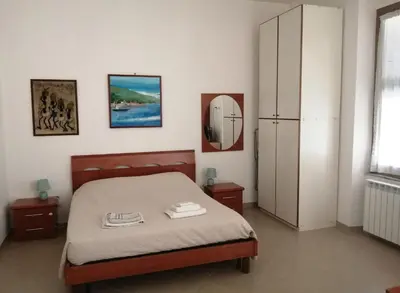 Letto o letti in una camera di Casa Minù