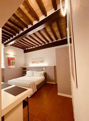 Letto o letti in una camera di Palazzo Borgocolonne Apartments - Manu Maison