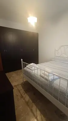 Letto o letti in una camera di Battisti