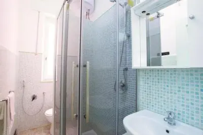Bagno di Classic Monterossino Apartment in Old Town