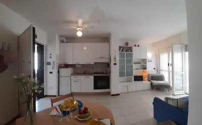 Cucina o angolo cottura di La terrazza tra il Mare e gli Ulivi by Holiday World