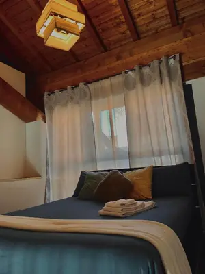Letto o letti in una camera di LOFT DEI LUPI Elegante appartamento a 260 m dal Duomo free parking