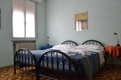 Letto o letti in una camera di La Buonanotte