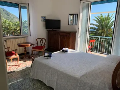Letto o letti in una camera di Il cuore di Moneglia - MONEGLIA APARTMENTS