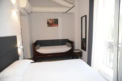 Letto o letti in una camera di TLcafè Hospitality