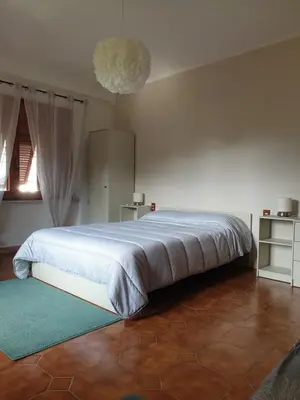 Letto o letti in una camera di La Casa dei Limoni