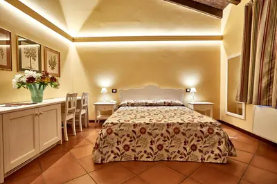 Letto o letti in una camera di Albergo Trattoria Il Leone