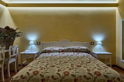 Letto o letti in una camera di Albergo Trattoria Il Leone