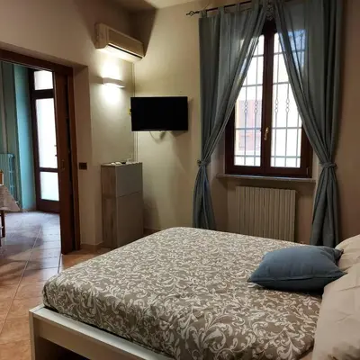 Letto o letti in una camera di Casa degli Artisti