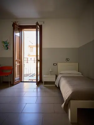 Letto o letti in una camera di L'Archetto
