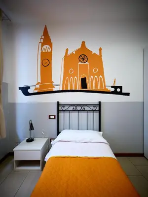 Letto o letti in una camera di L'Archetto