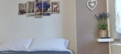 Letto o letti in una camera di La Castagna Matta