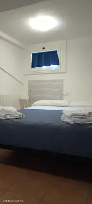 Letto o letti in una camera di La Castagna Matta