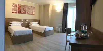 Letto o letti in una camera di TERRAZZA Rooms